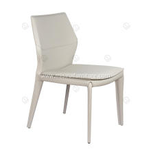 White saddle leather armless dining chairs